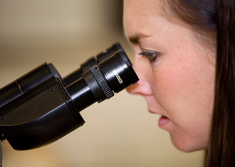 Girl with microscope